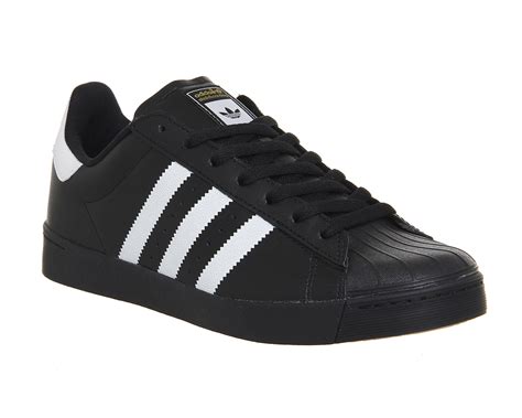 adidas black superstar shoes.